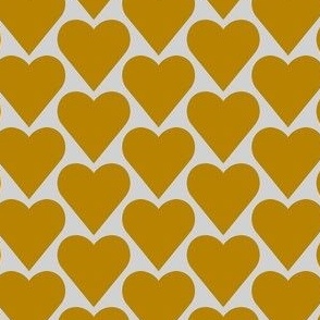 Mustard yellow heart on light gray background