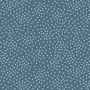 Scattered White Dots on Solid Blue Background