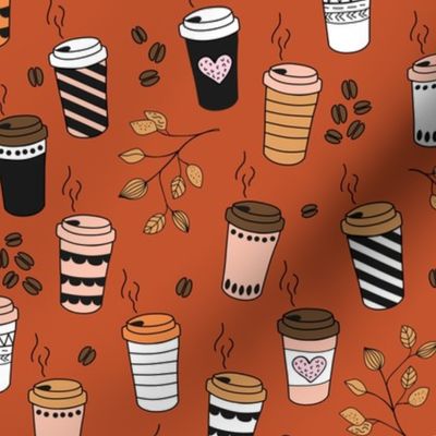 Good morning coffee to go with coffee leaves beans and  cups in orange pink on vintage red  fall