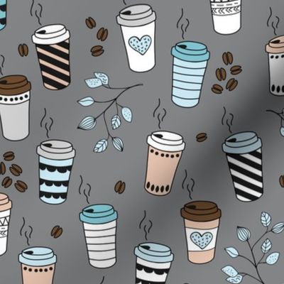 Good morning coffee to go with coffee leaves beans and  cups in blue gray beige on slate winter palette 