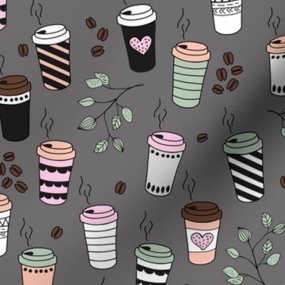 Good morning coffee to go with coffee leaves beans and  cups in mint green pink blush on gray
