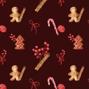 Gingerbread Cookies and Christmas berries (on red chocolate background)