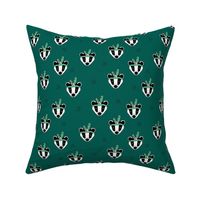 geometric ethnic badger friends with feathers mint gray on pine green 