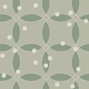 overlapping rings in artichoke green with beige dots on light olive green