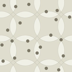 overlapping rings in white with olive green dots on light olive green