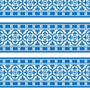 Medieval-style quatrefoil borders, blue on white