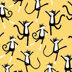 Dancing Black and White Tuxedo Cats Yellow