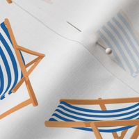 Blue Striped Deck Chairs on White Background
