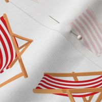 Red Striped Deck Chairs on White Background