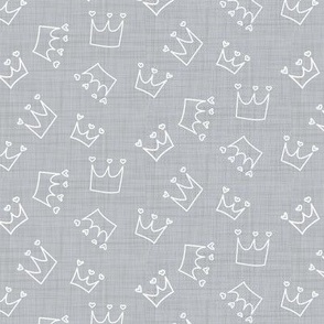 white crowns on gray linen texture