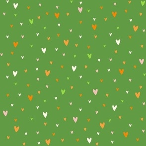 orange field hearts on green