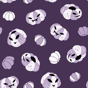 (large) Spooky pumpkins plum background