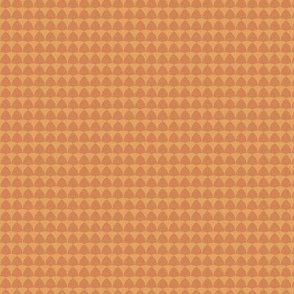 Art deco scallop geometric repeat pattern in warm autumn gold and ochre orange