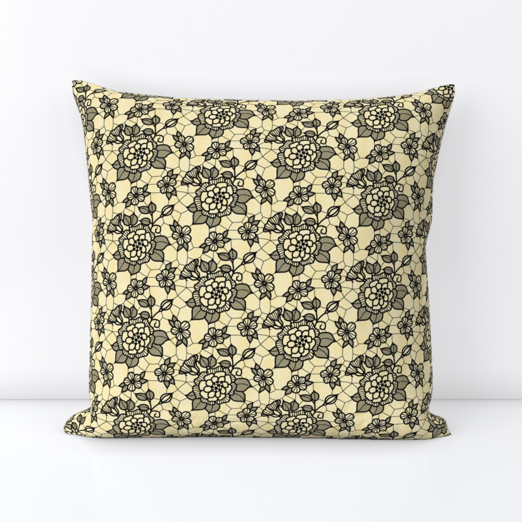 Black lace flower on pale gold 