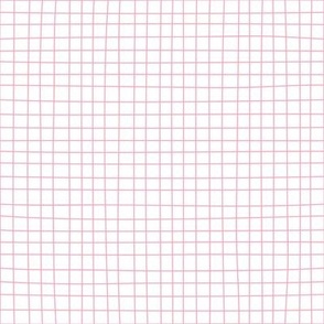 Cute  seamless pattern with hand-drawn  minimalistic little pink cell grid  on  white background.  Simple and stylish trendy abstract fabric design. Check repeated texture.