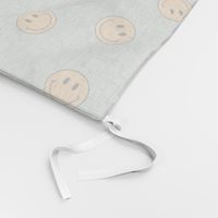 Tossed Muted Smiley Faces in Yellow on Sage Green