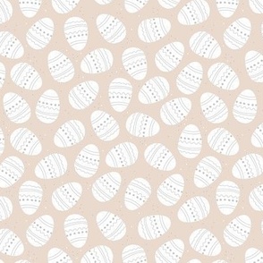 Sweet boho style minimalist easter eggs fun springtime egg hunt design in soft pastel beige 