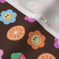 Rainbow Smiley Flowers Strawberries  and Citrus Fruits on Dark Brown