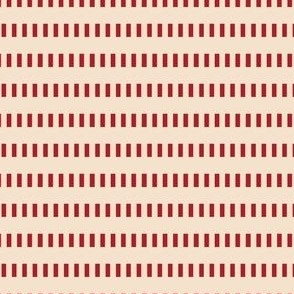 red design on tan background