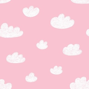 Fluffy White clouds in Pink sky