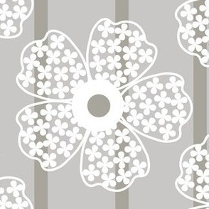 white and gray flowers on gray background