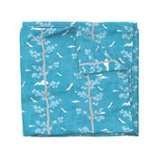 Pines and Cranes in Turquoise Blue (medium scale) | Forest fabric, bird fabric in bright blue. Japanese print fabric, tree fabric with cranes and snow.