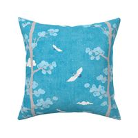 Pines and Cranes in Turquoise Blue (medium scale) | Forest fabric, bird fabric in bright blue. Japanese print fabric, tree fabric with cranes and snow.