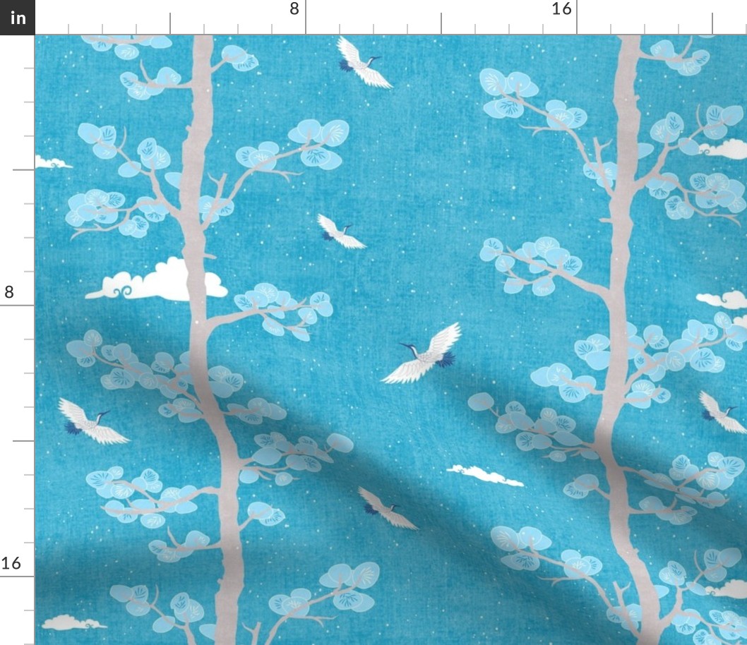 Pines and Cranes in Turquoise Blue (medium scale) | Forest fabric, bird fabric in bright blue. Japanese print fabric, tree fabric with cranes and snow.