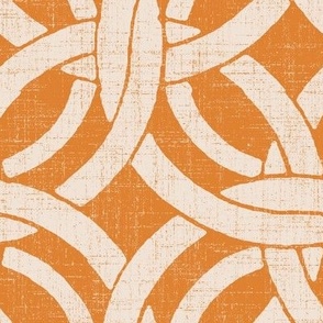 large lattice circle on orange in cream reverse linen
