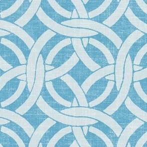 medium lattice circle in light gray on sky with linen texture