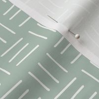 Mudcloth linnen cotton stripes neutral pastel nursery soft Scandinavian style white on sage green