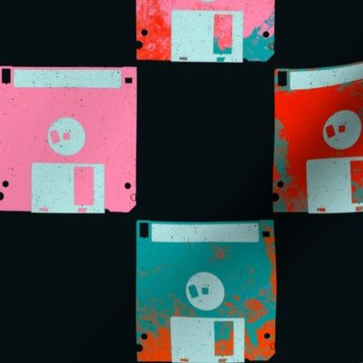 colorful floppy disks on a black background