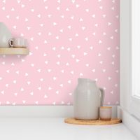 Small scale // Topsy turvy irregular triangles coordinate // pastel pink background white triangular shapes 