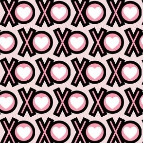 XO pink and black Valentine's Day design  with white heart on pink background