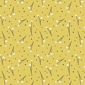 dots and branches on yellow