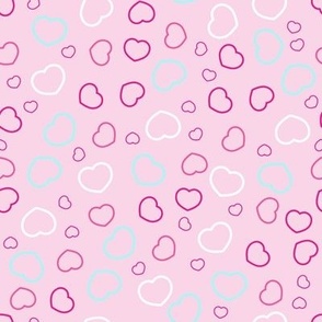 little hearts on pink background