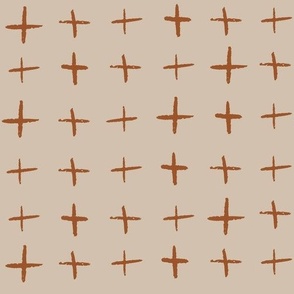 Tan crosses