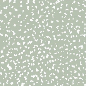 Gritty spots and speckles sweet boho style minimalist animal print texture  baby nursery print neutral white on sage green 