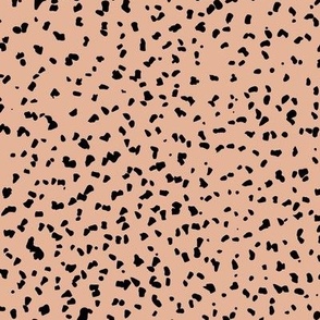 Gritty spots and speckles sweet boho style minimalist animal print texture  baby nursery print neutral black on peach orange