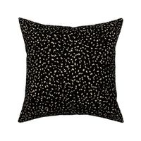 Gritty spots and speckles sweet boho style minimalist animal print texture  baby nursery print beige on black
