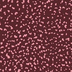 Gritty spots and speckles sweet boho style minimalist animal print texture  baby nursery print pink on burgundy red
