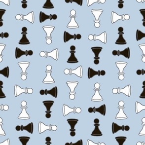 Black and White Chess Pawns on Blue