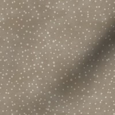 Sand dots on neutral brown texture