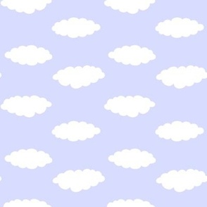 Fluffy clouds on lilac