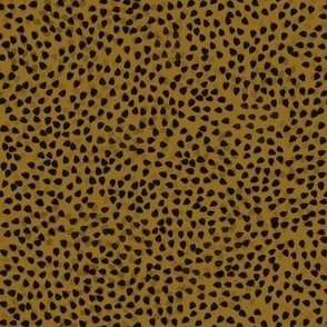 flocking dots, black on ochre