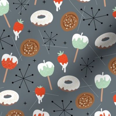 Mid-century vintage snacks apples donuts strawberries and cinnamon buns fifties bakery retro style red mint on cool gray 