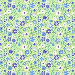 Ditsy white, purple and blue flowers on green 