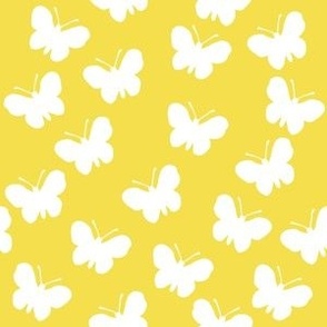 White butterflies on Illuminating Yellow (medium)