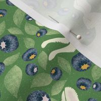 white bunnies leaping through the blueberry field on Kelly green | cream white, navy blue, mustard and blush pink on textured mid green / Kelly green | medium M