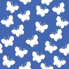 White butterflies on royal blue (medium)